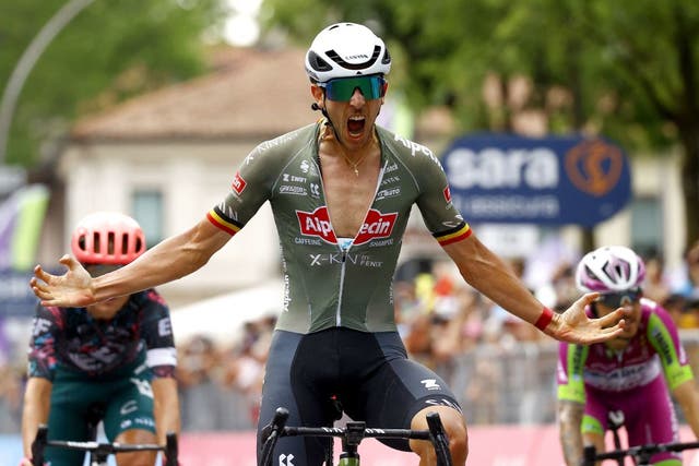 <p> Dries De Bondt celebrates after crossing the finish line of the 18th stage of the Giro d'Italia</p>