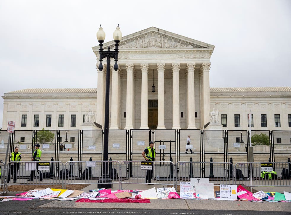 <p>Fencing surrounds the Supreme Court ahead of the anticipated ruling </p>