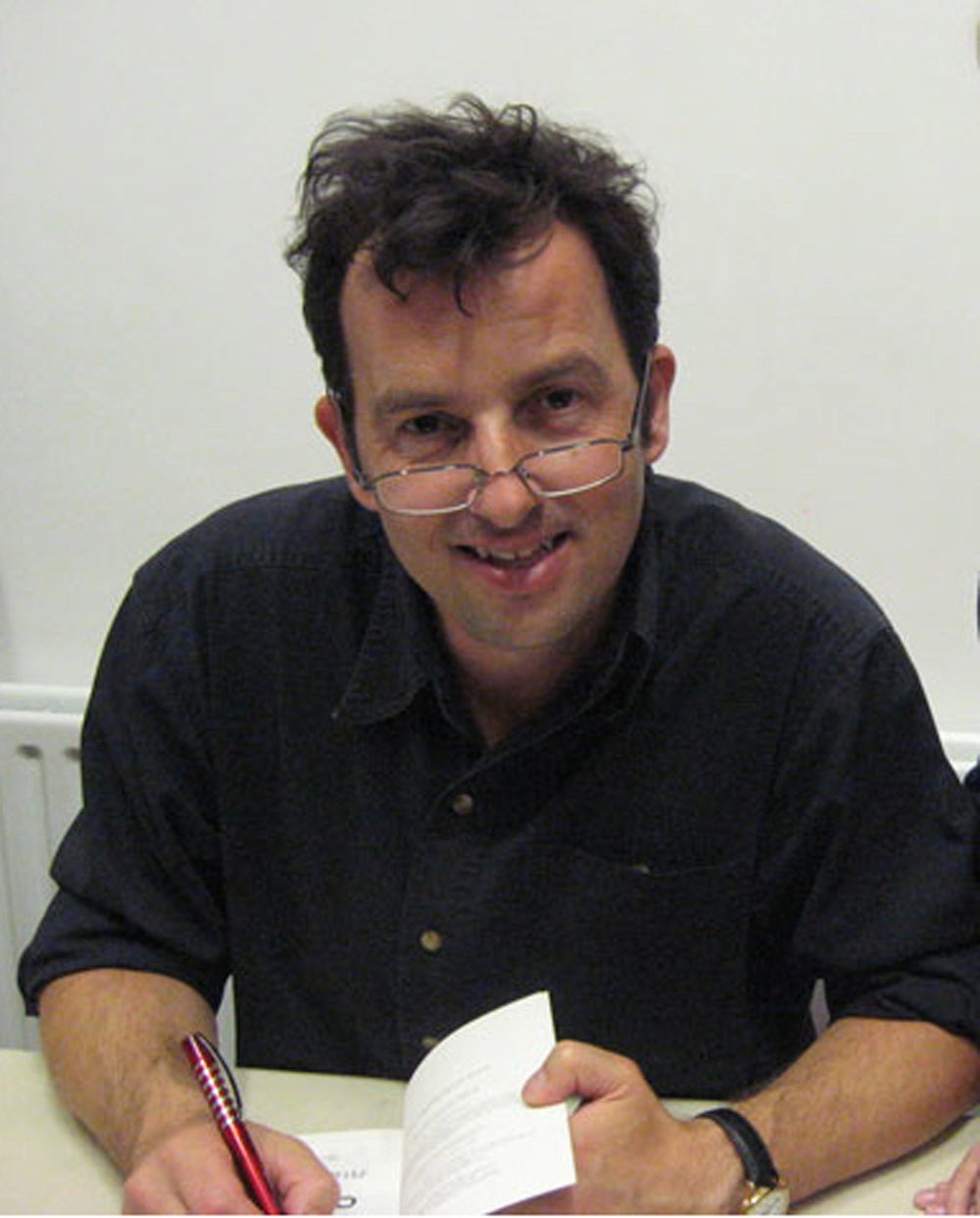 Author Alex Woolf at a book signing (Collect/PA Real Life)