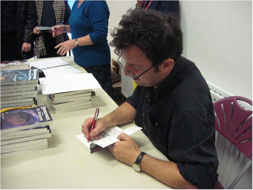 Author Alex Woolf at a book signing (Collect/PA Real Life)