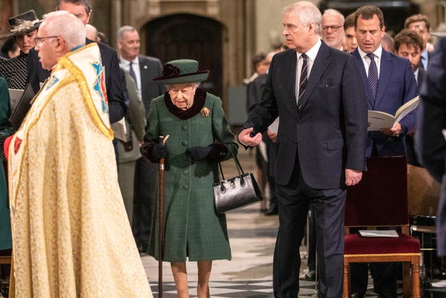 <p>Prince Andrew accompanies the Queen to her seat at the Service of Thanksgiving for the Duke of Edinburgh in March 2022</p>