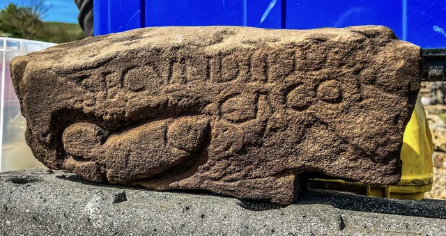 <p>The stone shows a large phallus next to the name of a Roman soldier and the word “Cacor”</p>