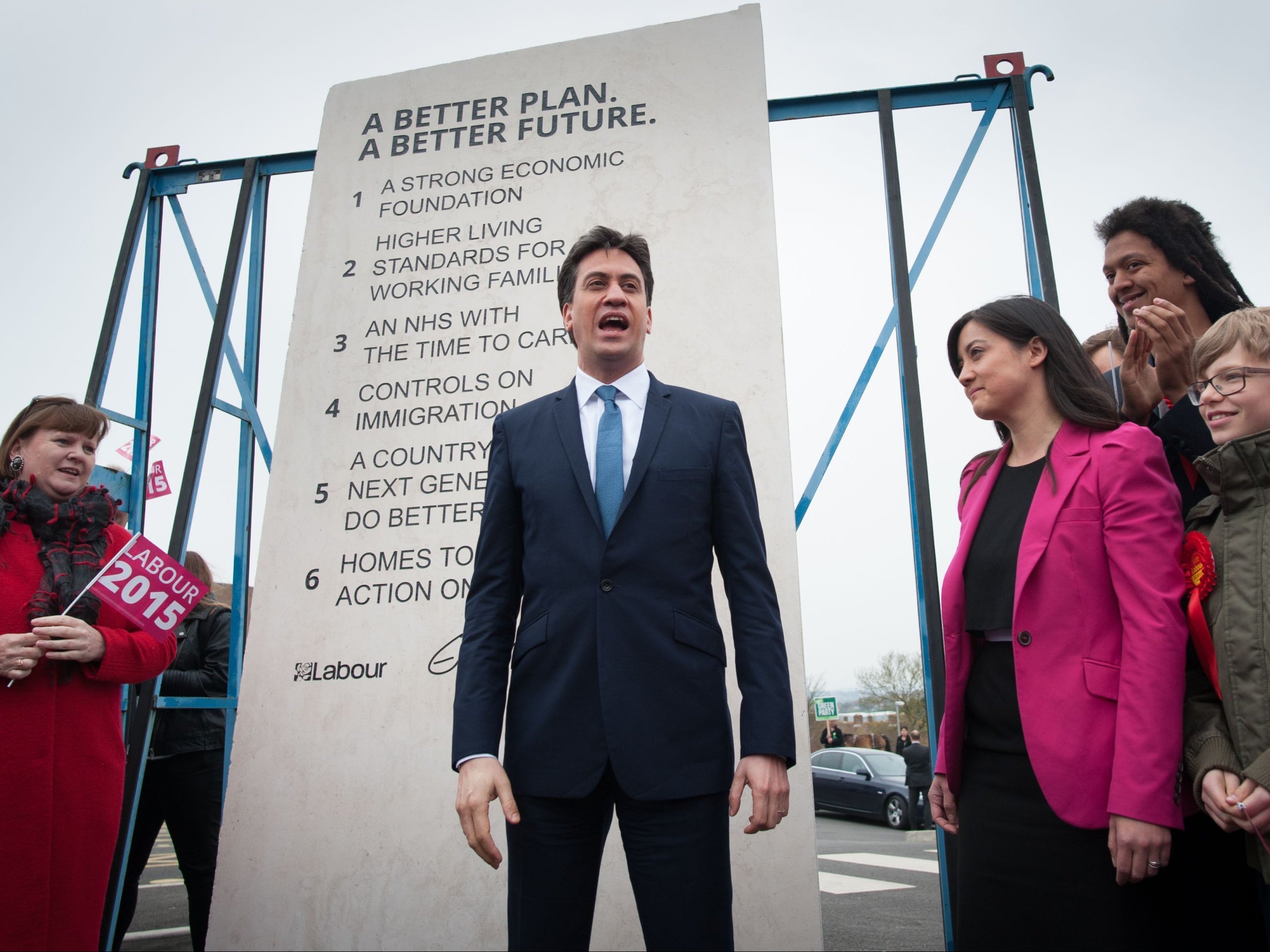Labour leader Ed Miliband unveils Labour’s pledges carved into a stone plinth in Hastings during general election campaigning on 2 May 2015