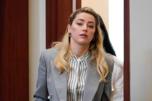 Amber Heard’s abuse claims ‘act of profound cruelty’ to real survivors, court hears (Steve Helber/AP)