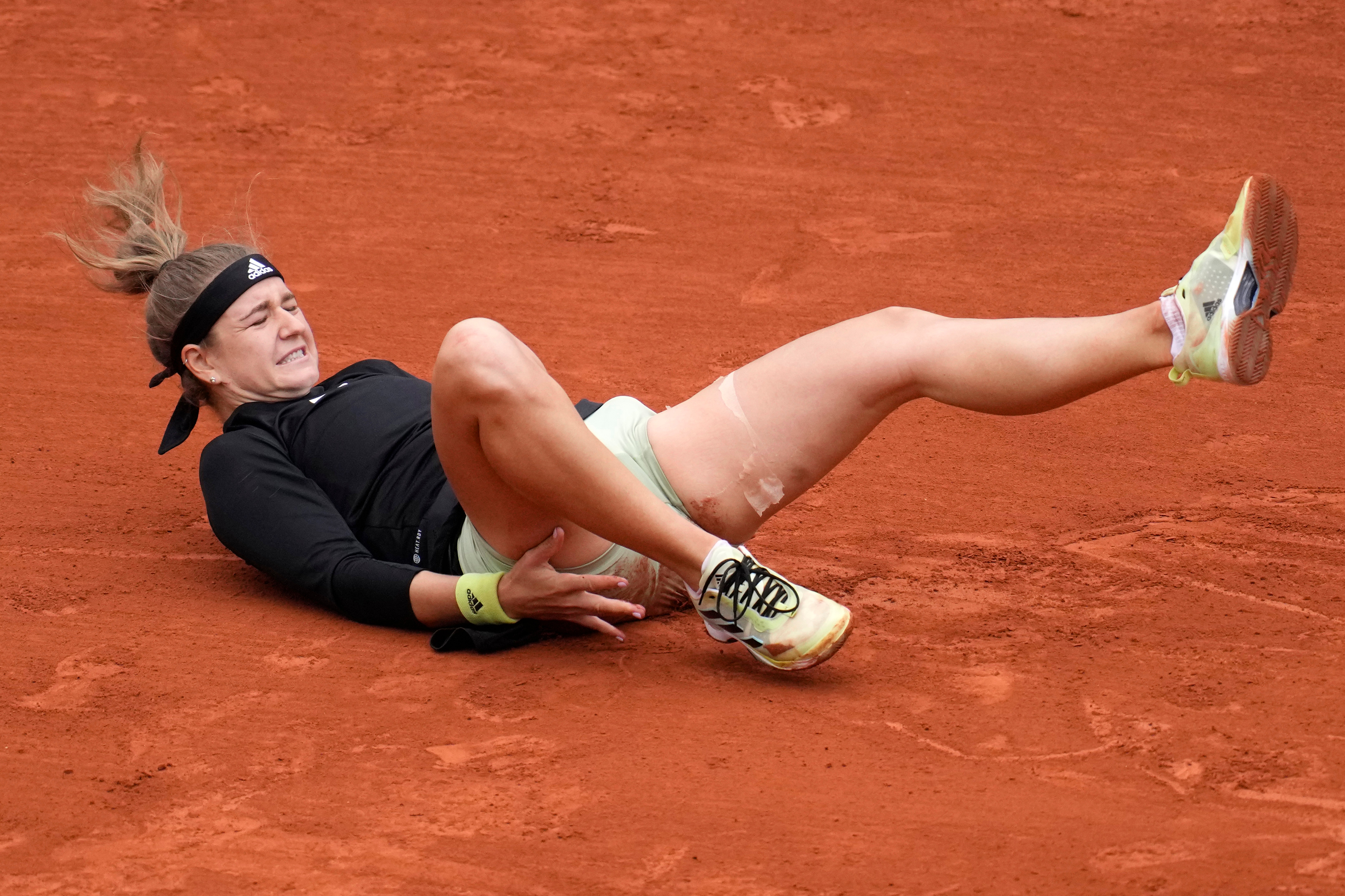 Karolina Muchova had to retire after twisting her ankle (Christophe Ena/AP)