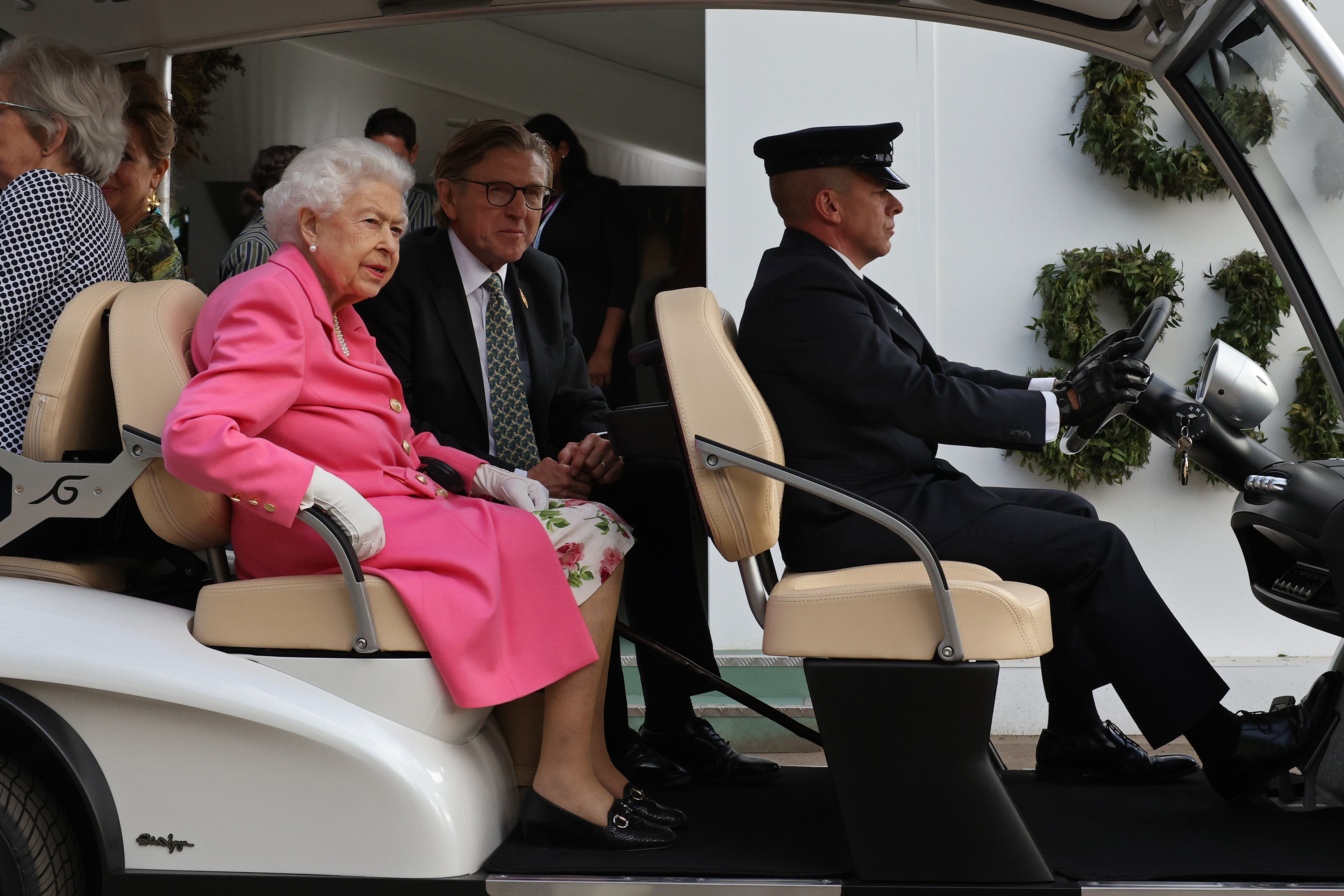 The Queen toured the Chelsea Flower Show by buggy and was joined by Keith Weed, President of the Royal Horticultural Society (Dan Kitwood/PA)