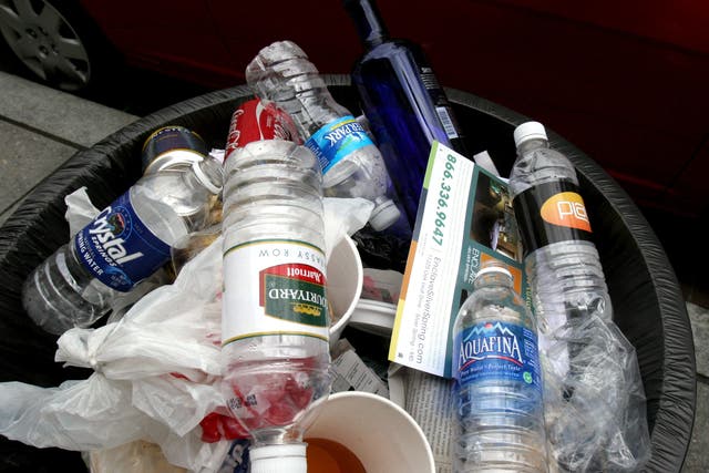 <p>Trash piles up in a Washington, DC trash can in 2008</p>