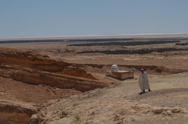 <p>A caretaker of the site in Sidi Blouhel where, in the 1977 ‘Star Wars’ movie, Luke Skywalker looked down on the Tusken Raiders</p>