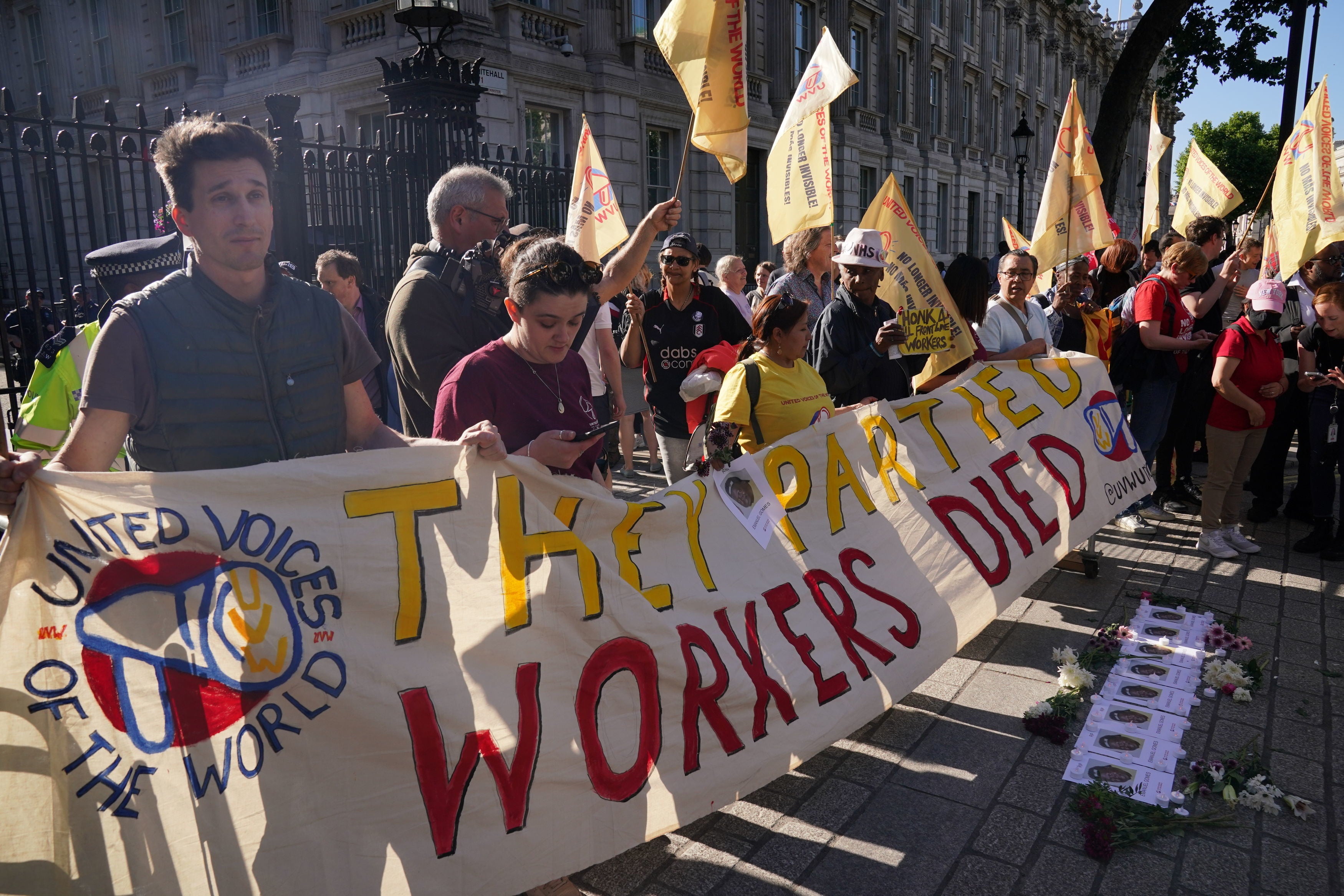 ‘They partied while workers died’: cleaners’ union members protest outside Downing Street