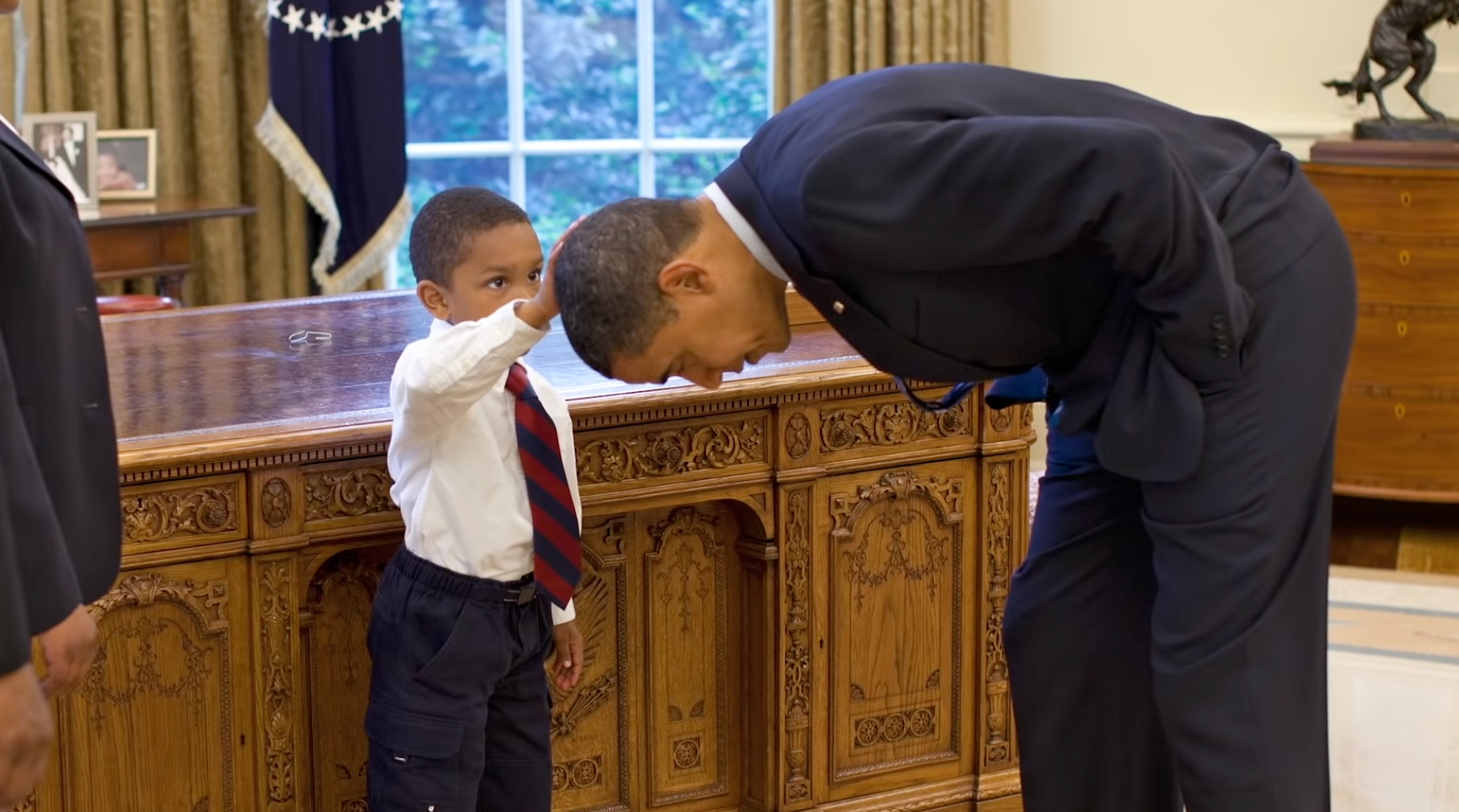 Barack Obama reunites with boy who touched his head in iconic 'Hair Like  Mine' photo | The Independent
