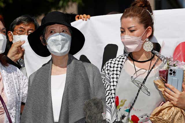 <p>Ms Shigenobu and her daughter Mei speak to journalists after her release on Saturday </p>