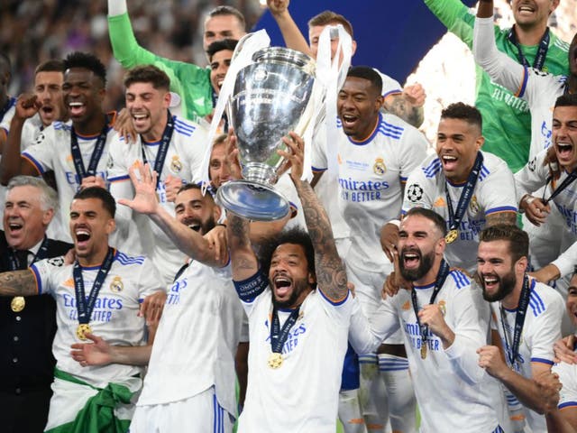 <p>Marcelo lifts the Champions League trophy</p>