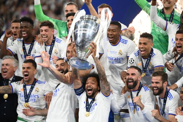 <p>Marcelo lifts the Champions League trophy</p>