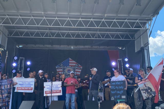 <p>Jon Stewart speaking on stage at the Rolling to Remember event in Washington DC on Saturday afternoon with veterans and veterans advocates </p>