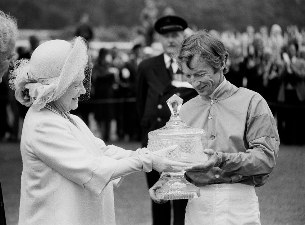 <p>Lester Piggott receiving the Ritz Club trophy from the Queen Mother in 1981</p>