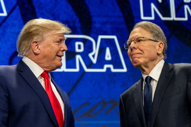 <p>Donald Trump and Wayne LaPierre at the National Rifle Association’s annual meeting In Houston</p>