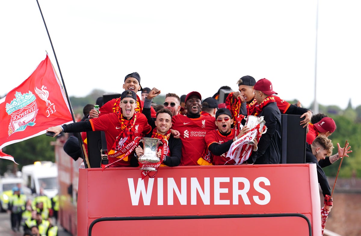 Liverpool celebrate cup double with fans despite Champions League defeat