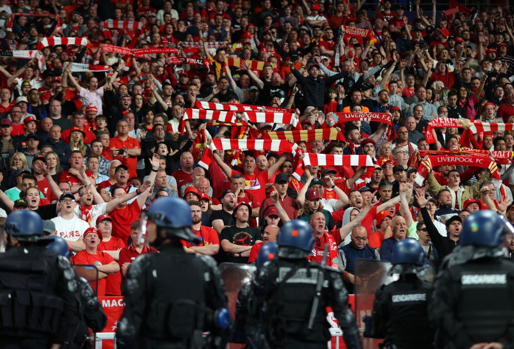 Riot police watching Liverpool fans during the UEFA Champions League final match between Liverpool FC and Real Madrid at Stade de France on May 28