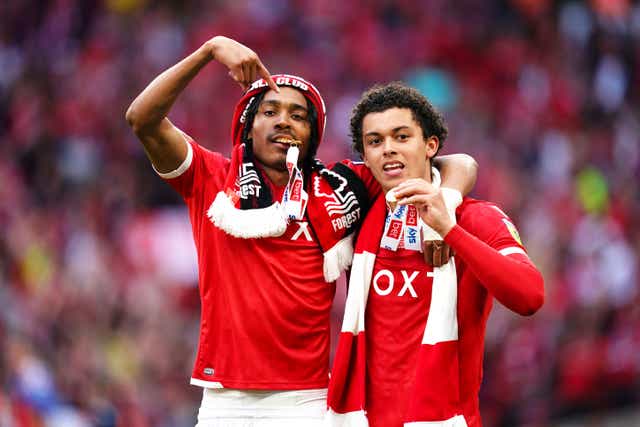 Nottingham Forest’s Djed Spence (left) and Brennan Johnson celebrate (John Walton/PA)