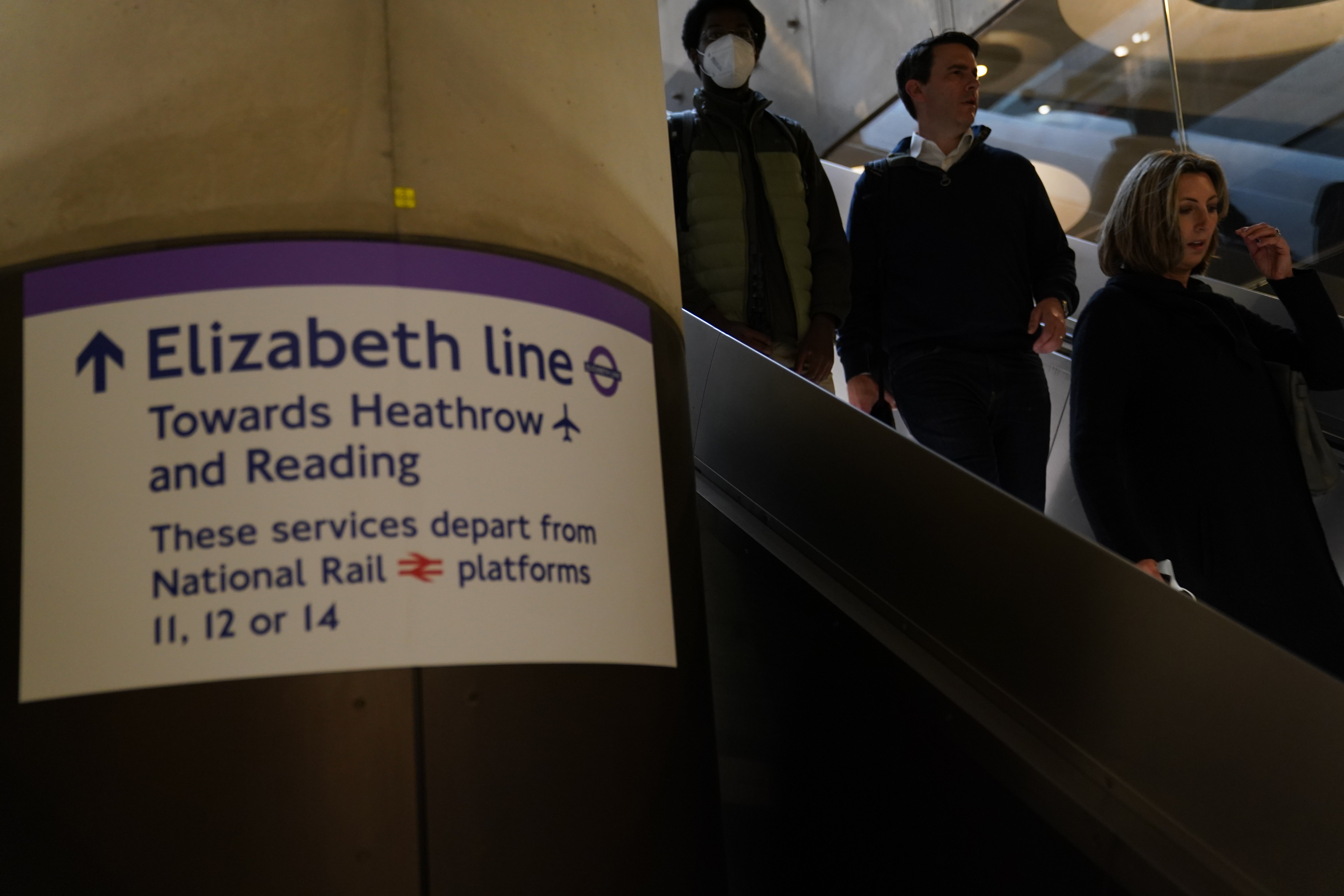 Passengers descend the escalators to the Elizabeth line platforms at Paddington Station, London (Kirsty O’Connor/PA)