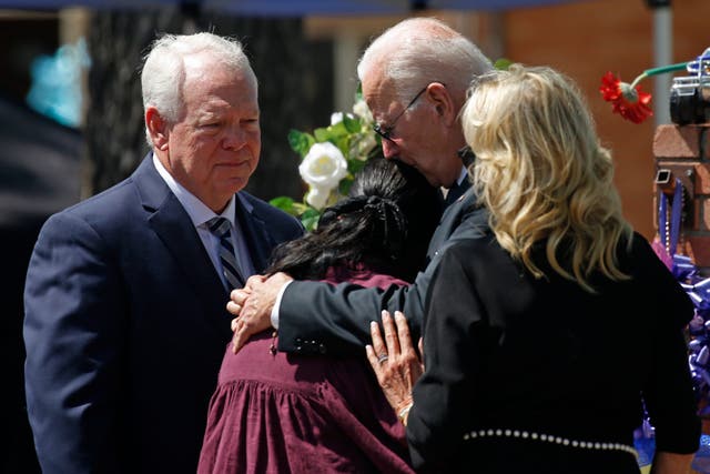 <p>President Joe Biden comforts Robb Elementary School Principal Mandy Guttierez after massacre </p>