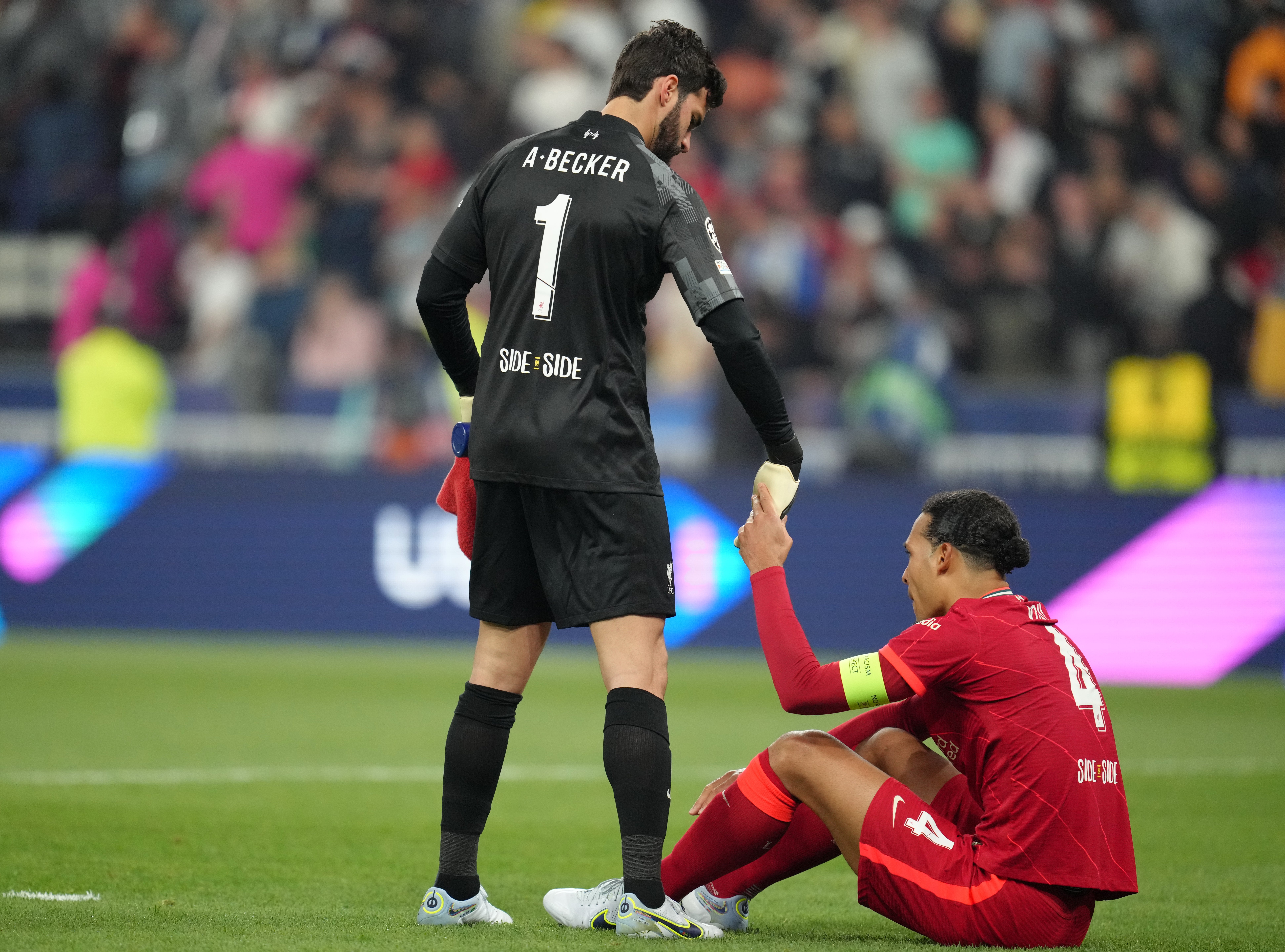 Liverpool keeper Alisson Becker consoles Virgil van Dijk after the final whistle at the Stade de France (Nick Potts/PA)