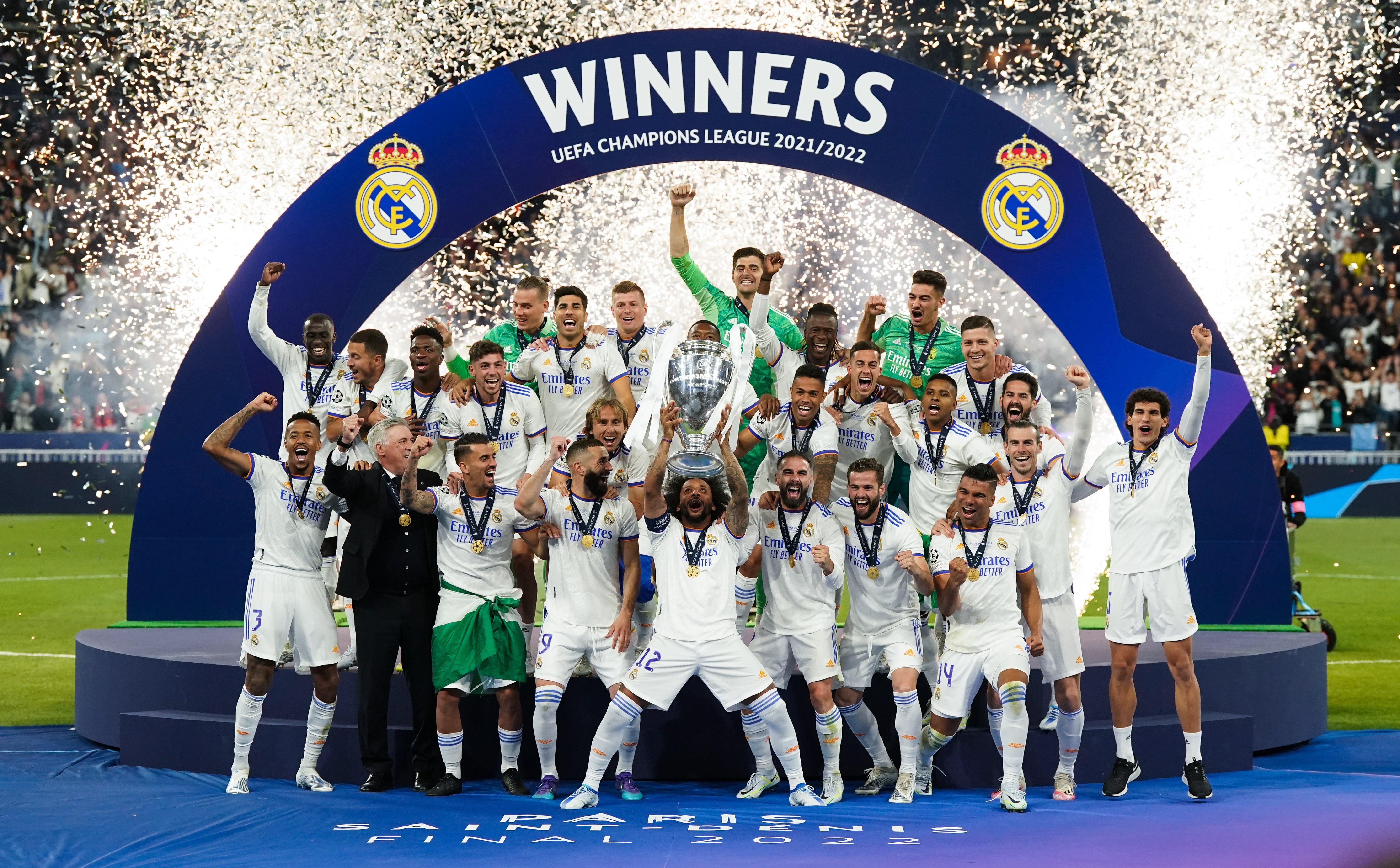 Real Madrid’s Marcelo lifts the trophy as they celebrate winning the Champions League against Liverpool (Nick Potts/PA)