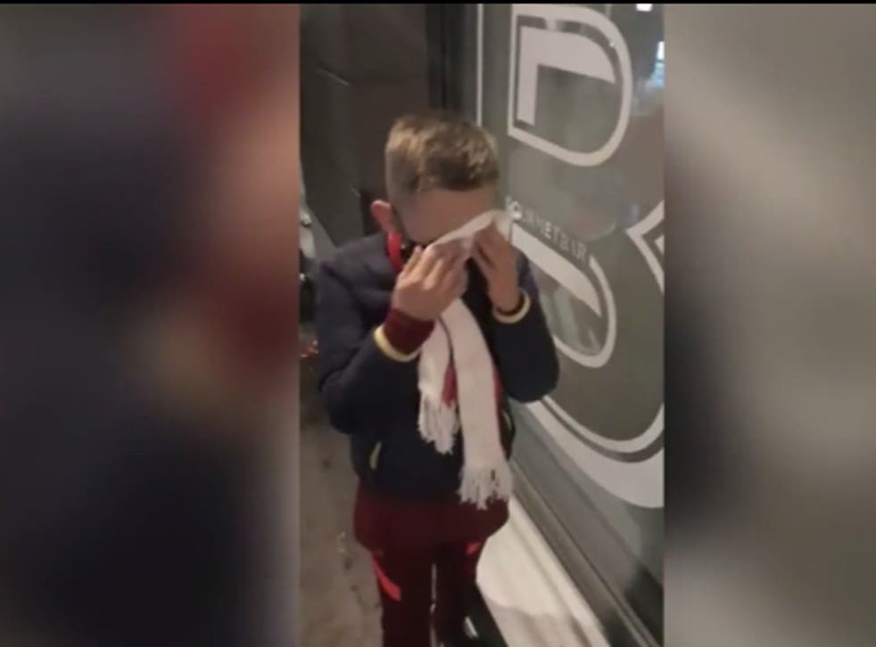 <p>Footage shows a boy wiping his eyes after being hit by tear gas at the Champions League final</p>