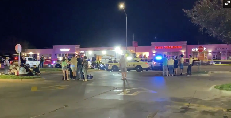 Two people are dead and at least 19 injured after a two-car crash into a crowd of pedestrians in Lincoln, Nebraska