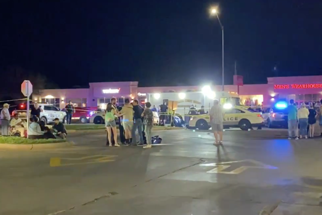 <p>Two people are dead and at least 19 injured after a two-car crash into a crowd of pedestrians in Lincoln, Nebraska</p>