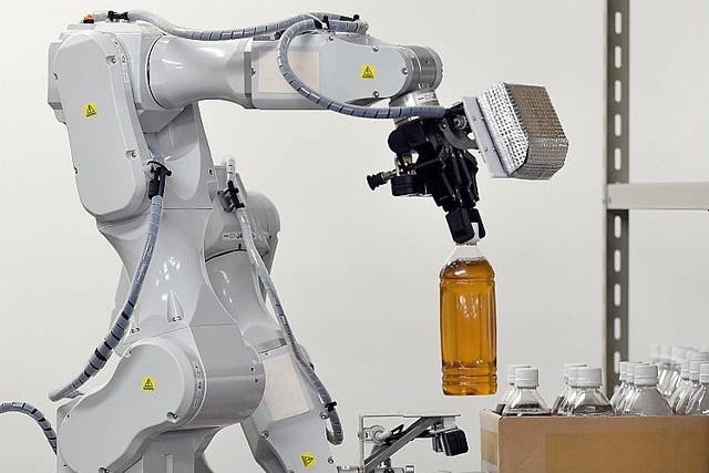 <p>Companies are spending millions on robots such as this Hitachi machine</p>