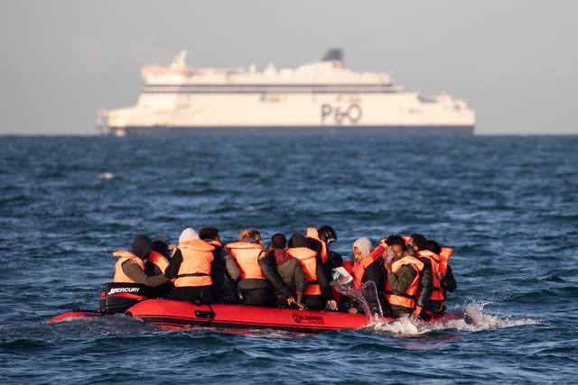 <p>File image: Migrants crossing the Channel on a small boat </p>