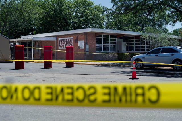 <p>Crime scene tape around Robb Elementary School following Tuesday’s massacre </p>