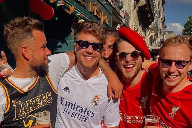 <p>Roman Kemp (white shirt, second from left) with friends in Paris for the Champions League Final</p>