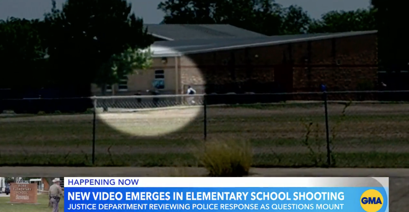 Students from Robb Elementary flee through broken windows and backdoors as police guide them away to safety from the site of the Uvalde school shooting.