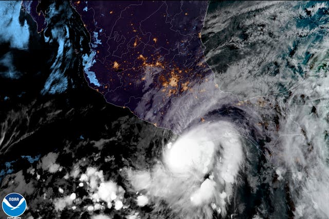 <p>This satellite image made available by NOAA shows Hurricane Agatha off the Pacific coast of Oaxaca state, Mexico on May 30, 2022</p>