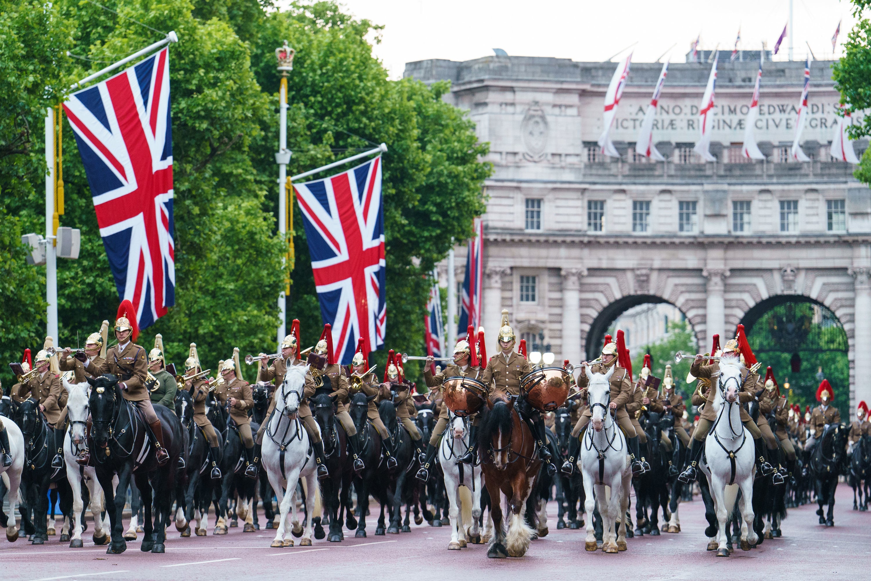 Troops of the Household Cavalry on The Mall, during an early morning rehearsal as service personnel from the Royal Navy, British Army, and Royal Air Force conduct a final early morning rehearsal through London ahead of Sunday’s Platinum Jubilee Pageant, which will mark the finale of the Platinum Jubilee Weekend (Dominic Lipinski/PA)