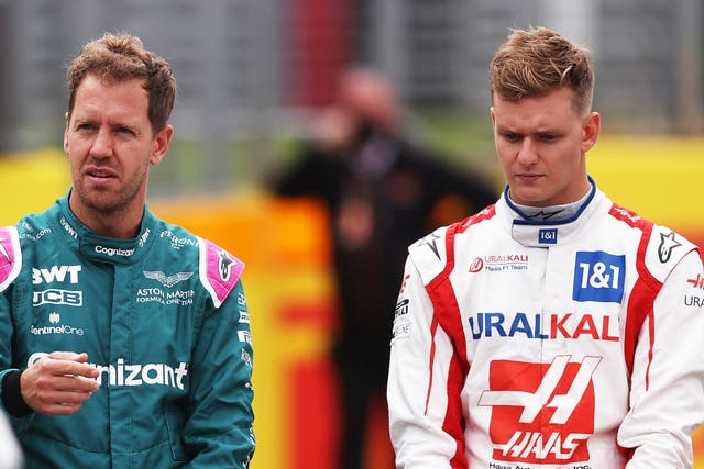 <p>Sebastian Vettel (left) has defended Mick Schumacher and suggested the Haas driver needs to be ‘left alone’ </p>
