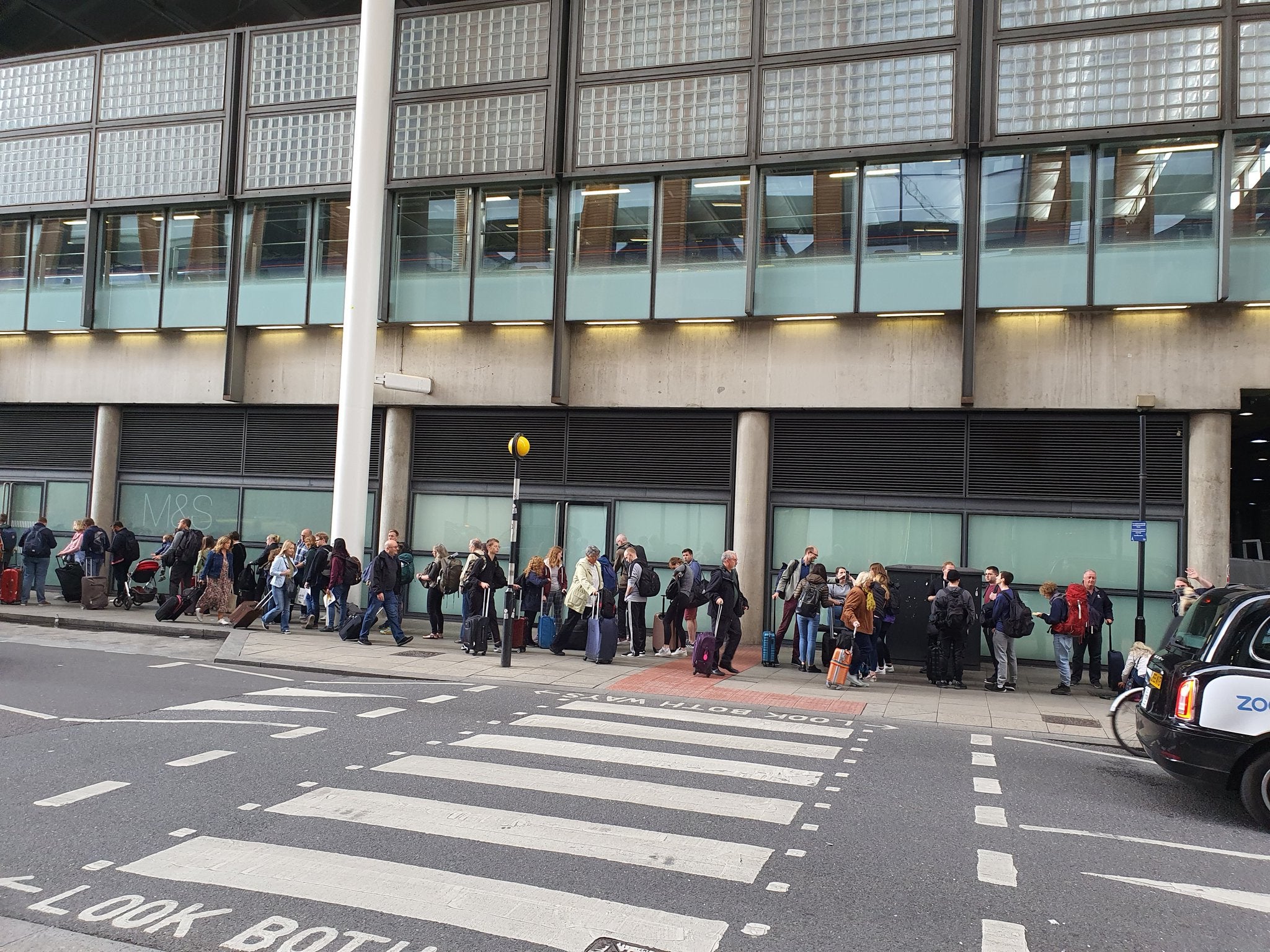 The queue outside St Pancras, London