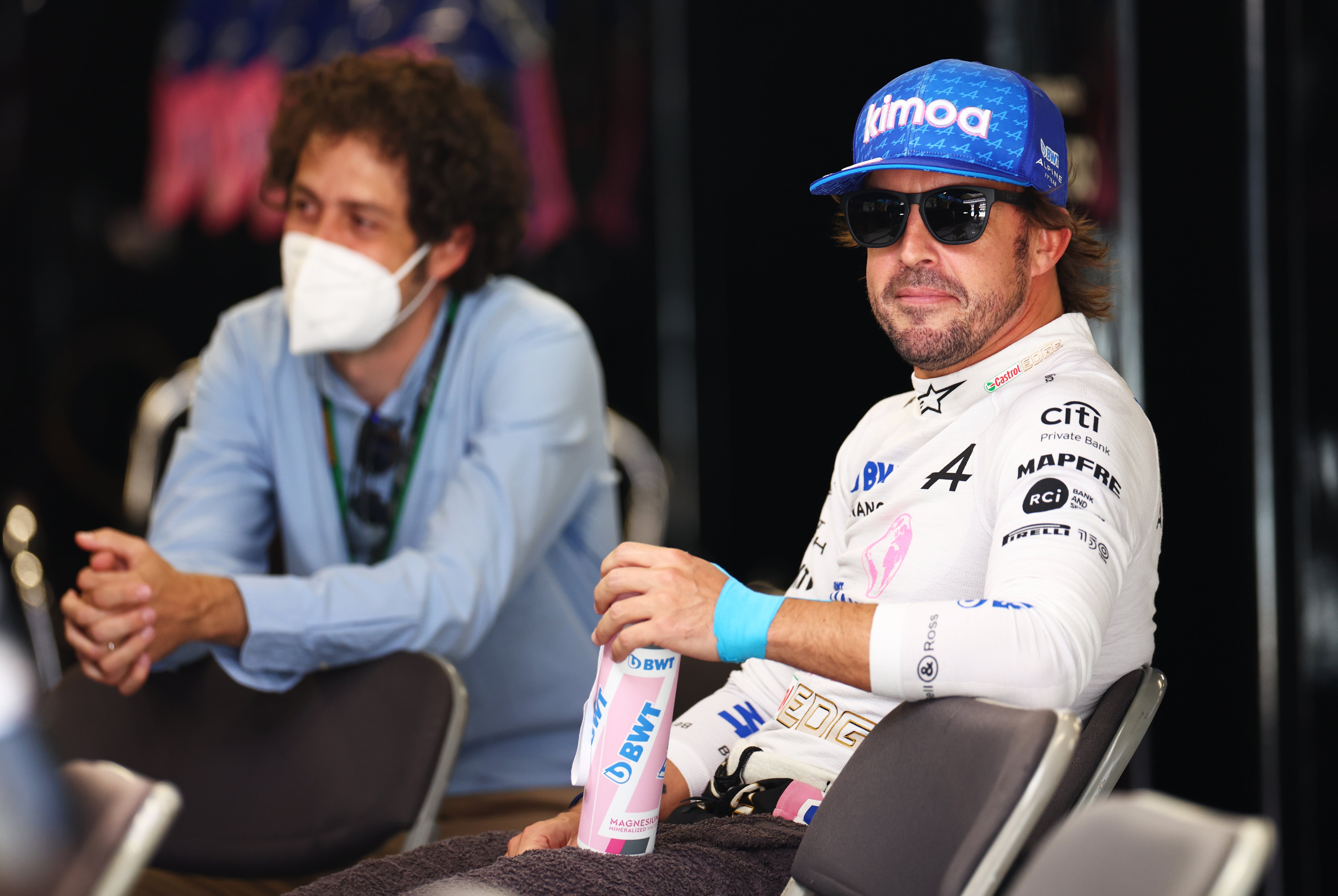 Fernando Alonso (right) collided with a wall in Melbourne in April