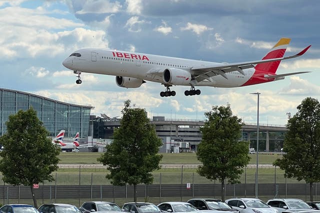 <p>Helping out: an Iberia aircraft landing at London Heathrow</p>