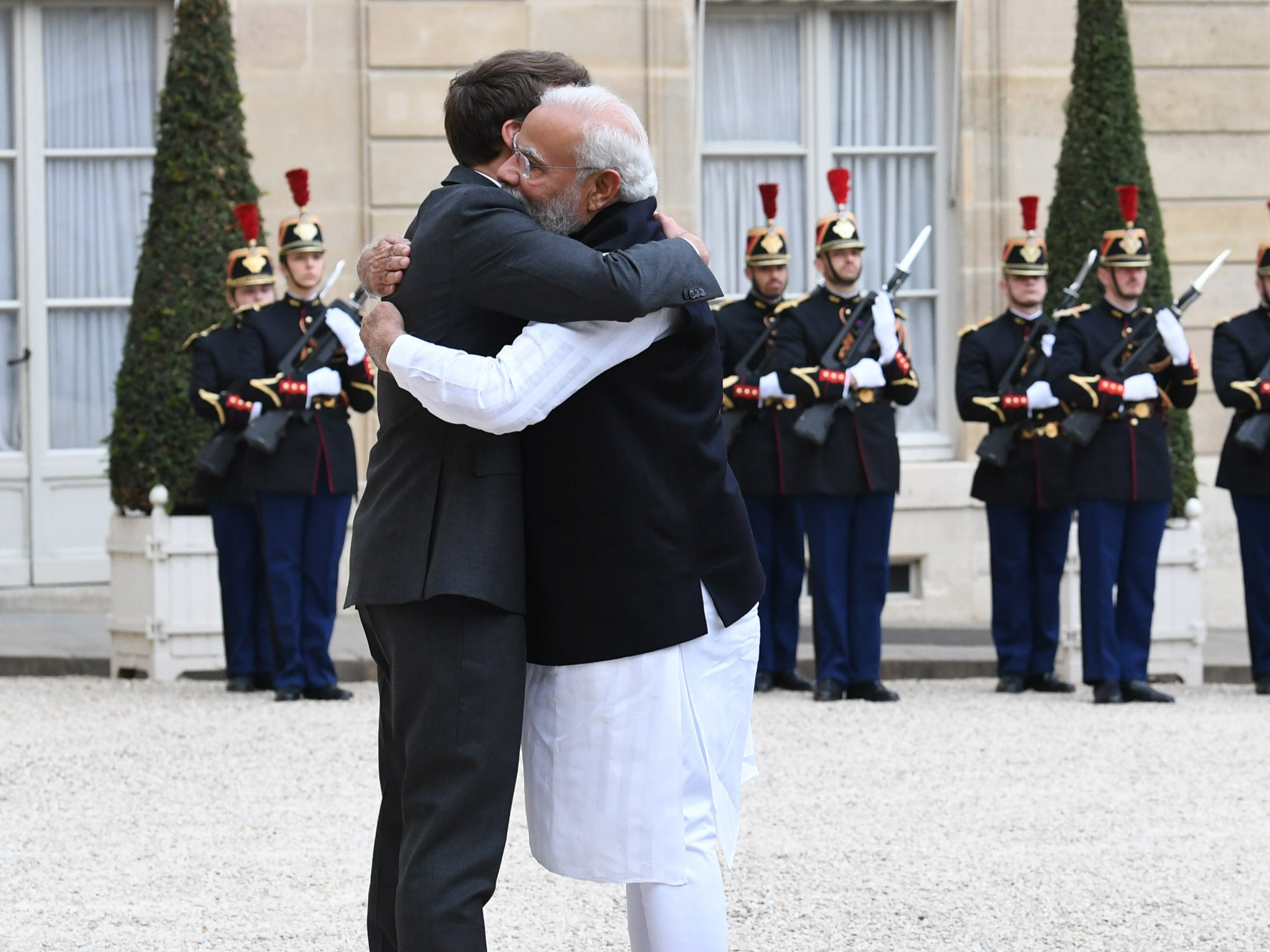 Indian prime minister Narendra Modi hugs French president Emmanuel Macron in Paris on 4 May