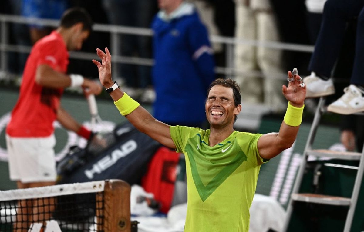 Rafa Nadal reacts after beating Novak Djokovic on an ‘emotional night’ at the French Open