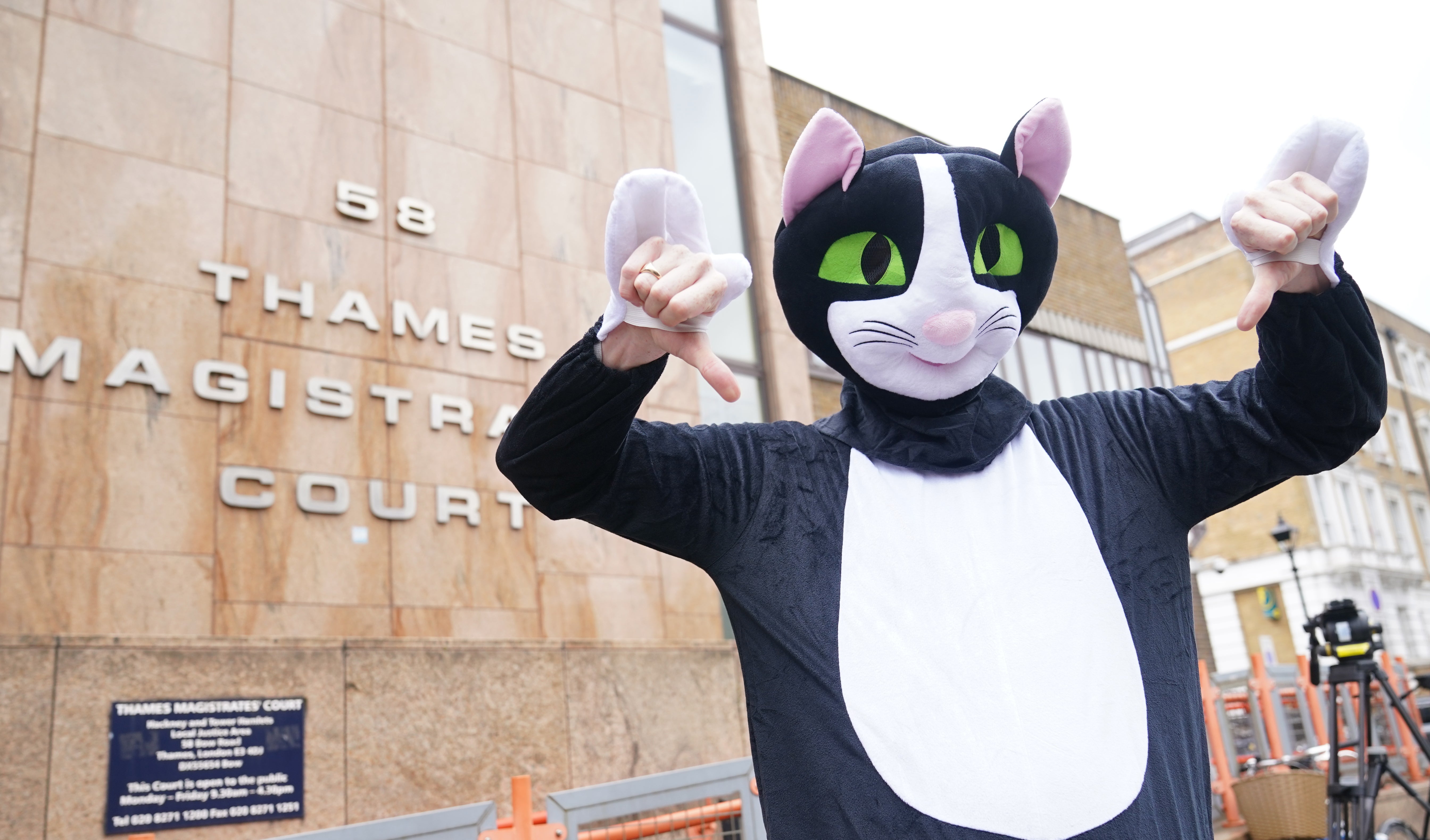 A person dressed as a cat outside Thames Magistrates’ Court (Yui Mok/PA)