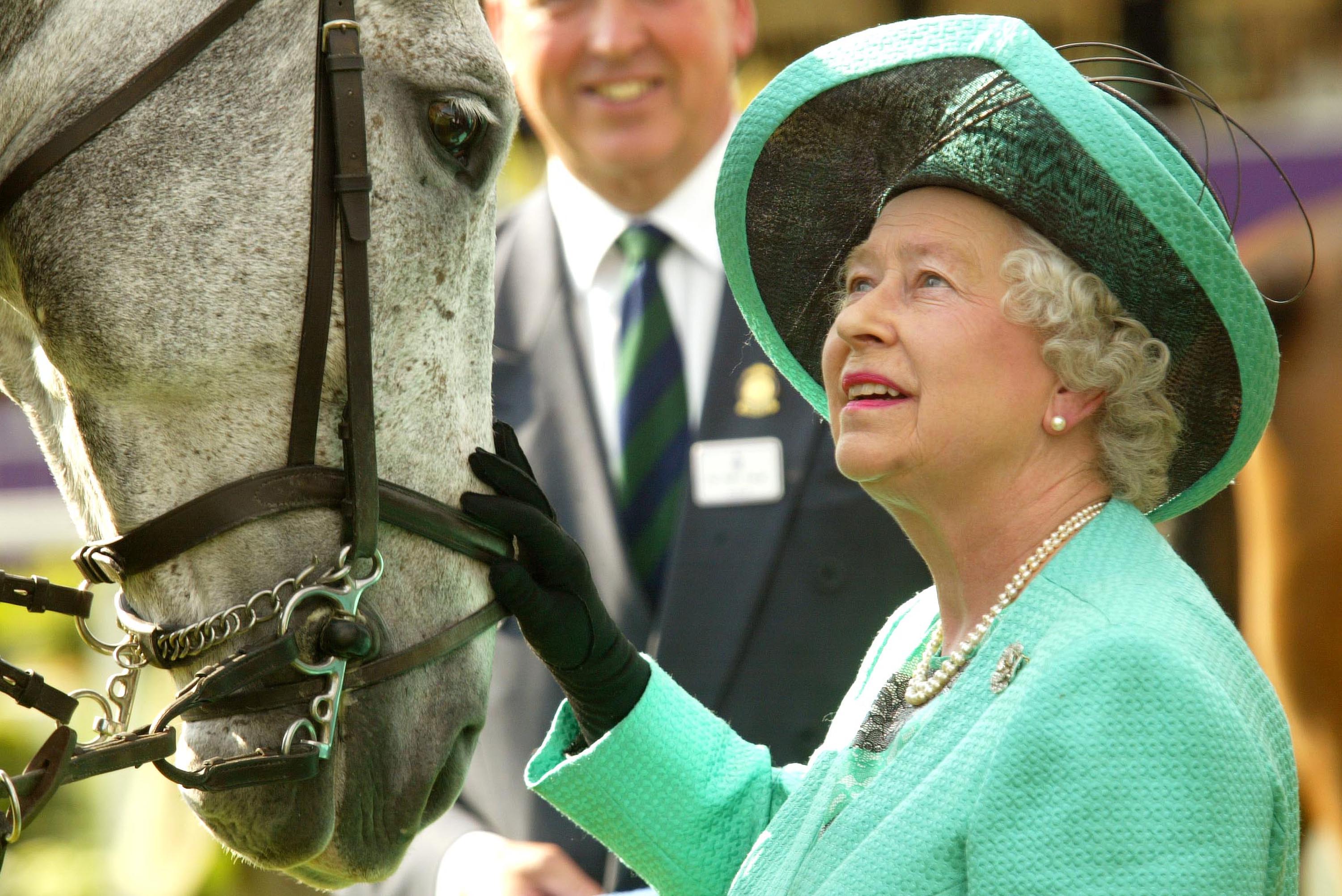 Queen Elizabeth II attends the third day of the Royal Windsor Horse Show at Home Park on 15 May 2004 in Windsor