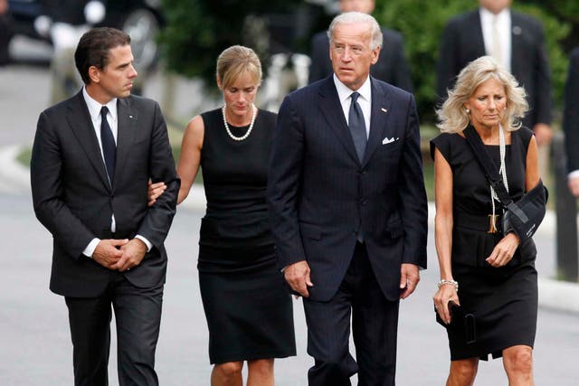 <p>From left to right: Hunter Biden, Kathleen Buhle (then Biden), Joe Biden, and Jill Biden </p>