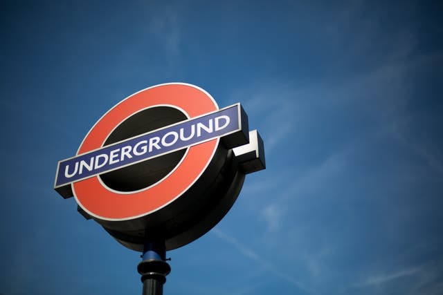 <p>A London Underground sign outside Oxford Circus tube station in central London.</p>