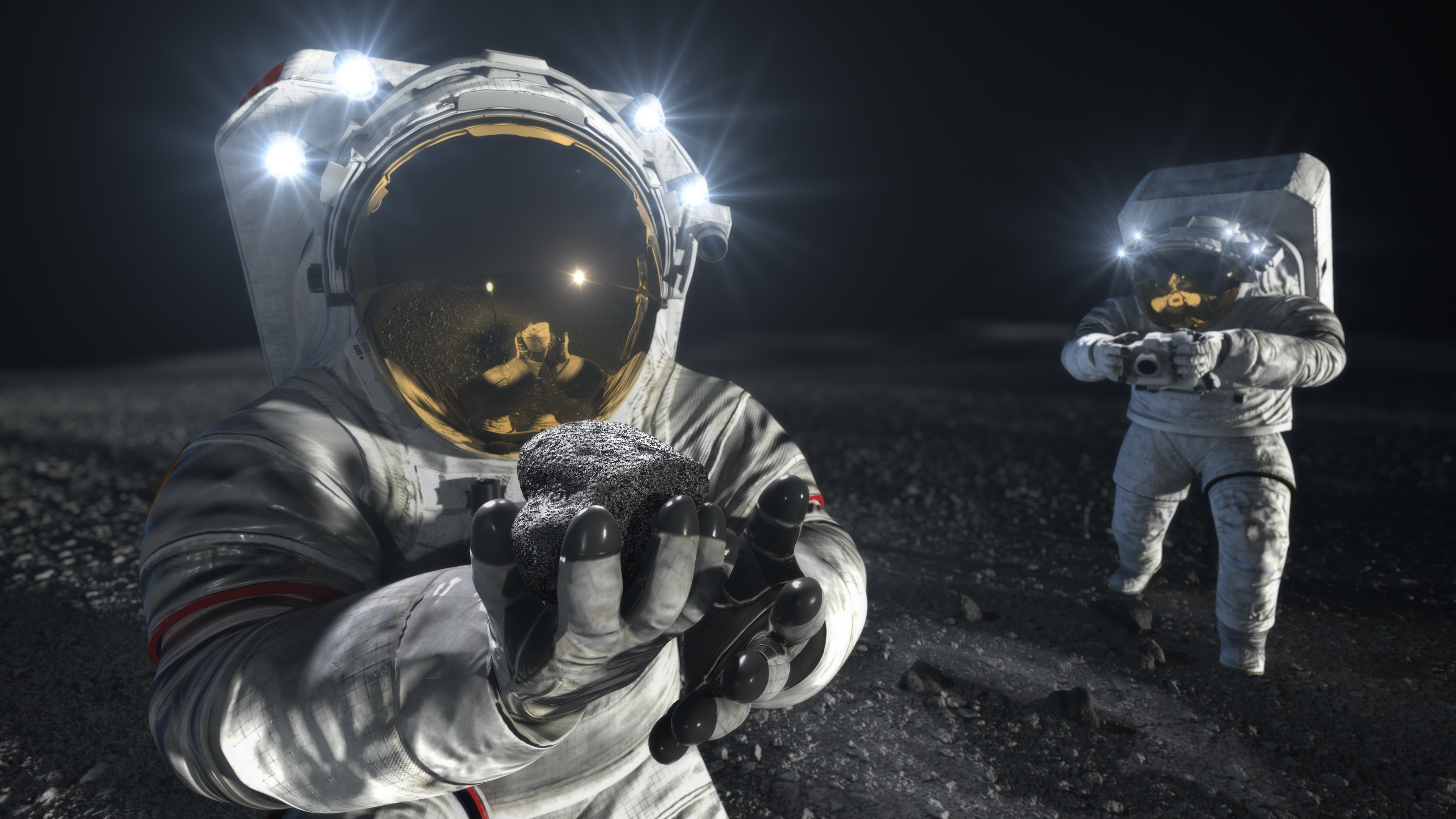 An artists conception of Nasa astronauts using new spacesuits on the Moon