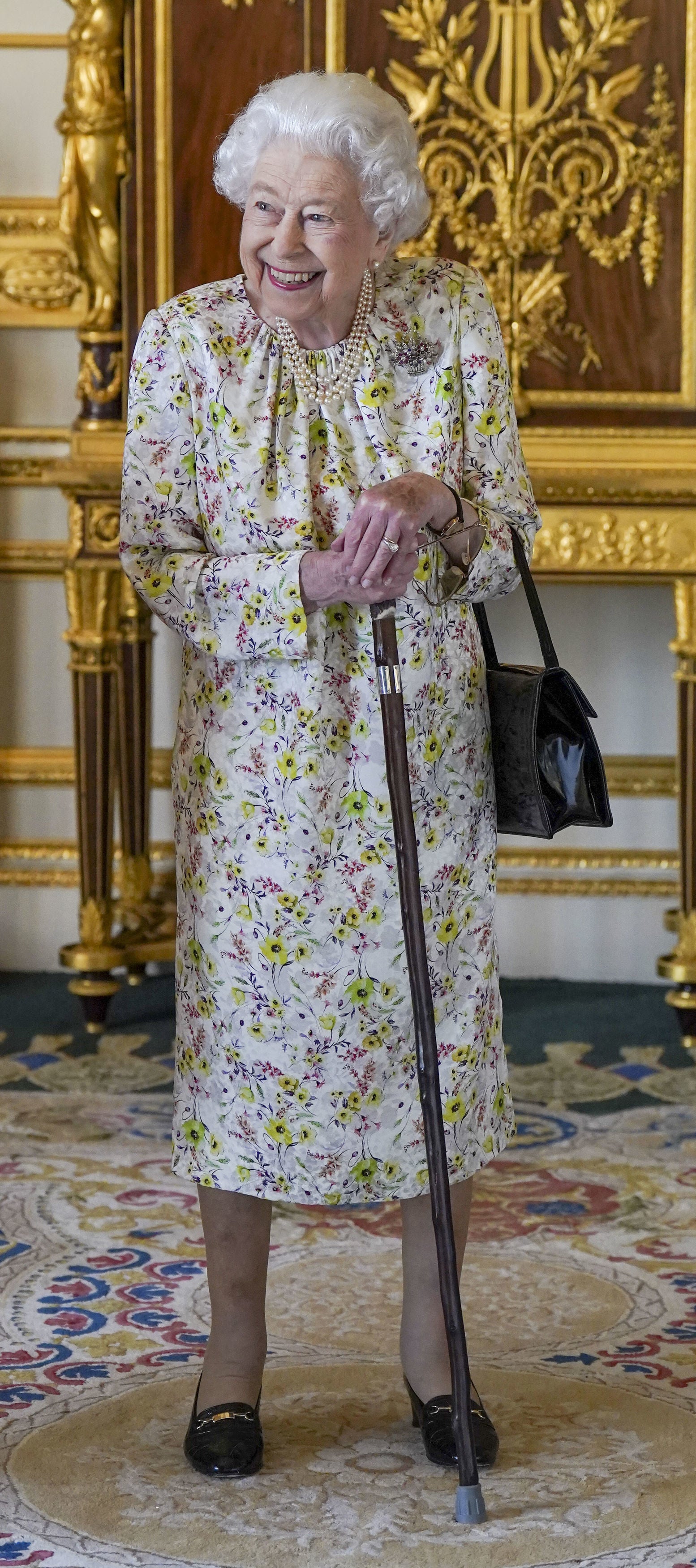 The Queen with her walking stick (Steve Parsons/PA)