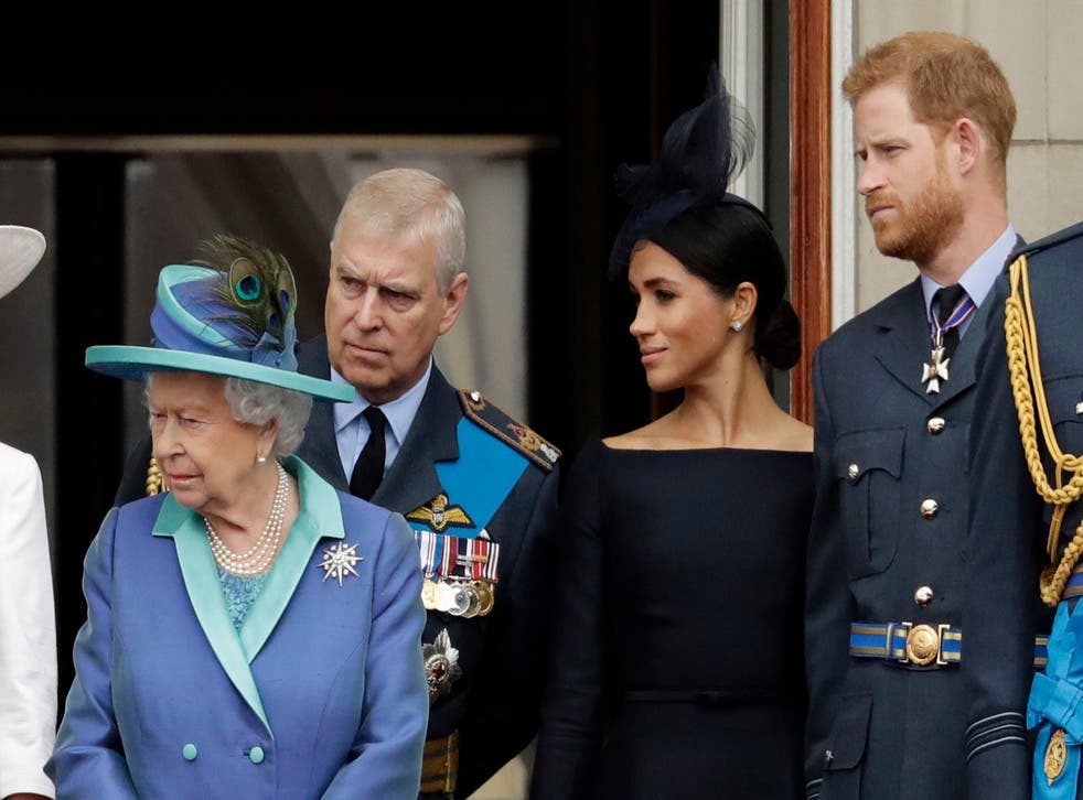 <p>Harry and Meghan with the Queen and Prince Andrew on the Buckingham Palace balcony in 2018 for an RAF flyover</p>